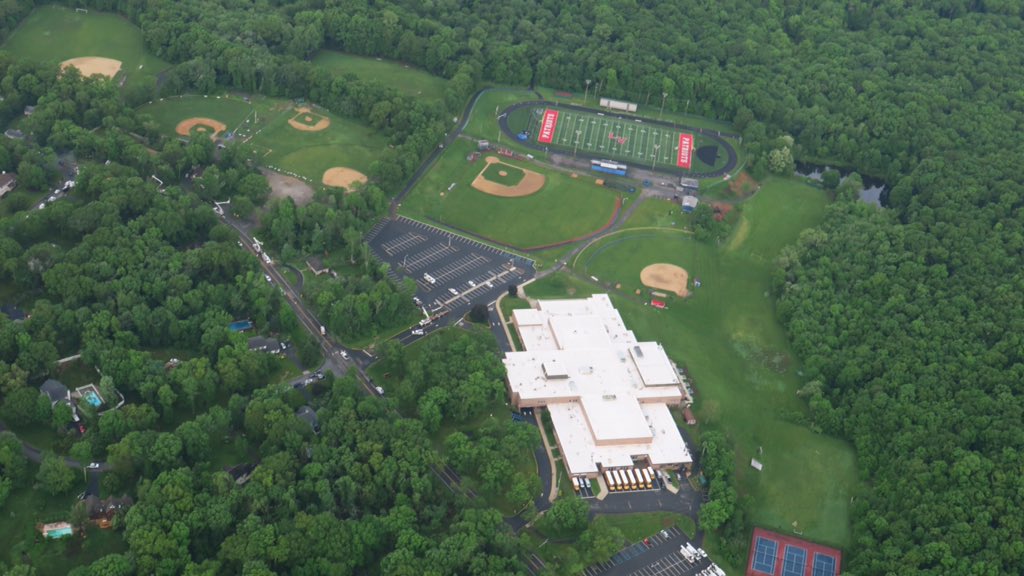 Trees down and debris on the football and baseball fields but no damage to the building at Lenape Valley Regional HS in Stanhope NJ