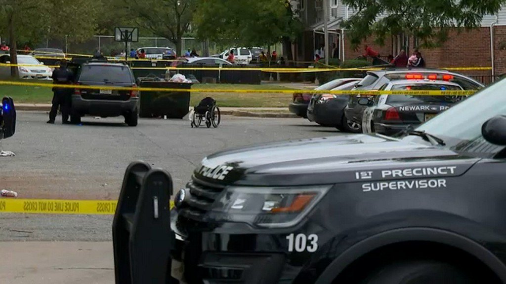 2 men killed near Newark funeral home, woman struck by stray bullet