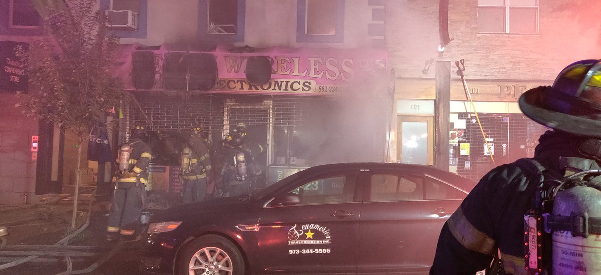 Newark WF 103 Ferry Street Fire 3 story apartment building. Store heavy fire 1st floor. All Hands Working
