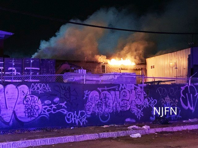 Newark WF  9-11  Verona Ave Fire in a large commercial building. Fire in rear on the C D side. Building was divided Into compartments and rooms. Had heavy fire involving a couple of rooms on the D SIde of the building. Heavy fire extended In to the roof