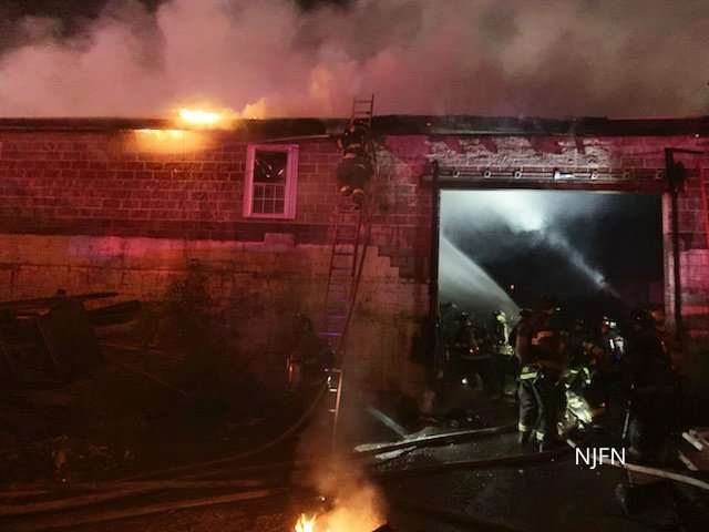 Newark WF  9-11  Verona Ave Fire in a large commercial building. Fire in rear on the C D side. Building was divided Into compartments and rooms. Had heavy fire involving a couple of rooms on the D SIde of the building. Heavy fire extended In to the roof