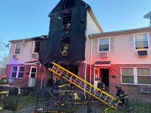 7 year old boy dies in early morning blaze. Newark Fire pulled father frantic save his boy's life off the roof.