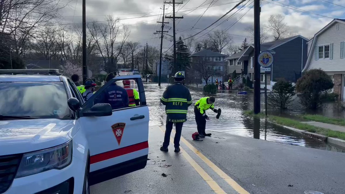 Water rescues underway in New Milford, NJ near River Edge after heavy rain last night. Neighbors say flooding is happening more frequently. 