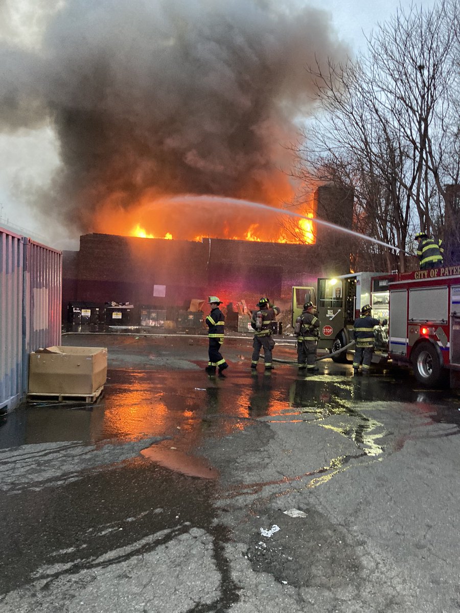 Paterson Fire Department battles 3 alarm commercial fire.  No injuries reported and all hands working