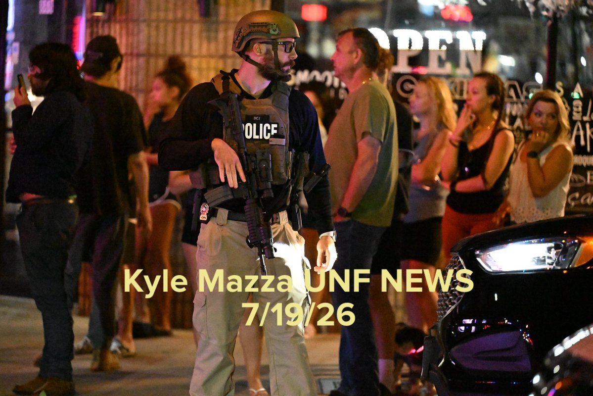 Authorities work the scene where multiple people were reported shot at a bar and lounge on Ridge Road in North Arlington, New Jersey, United States on July 19, 2026. Multiple people were reportedly injured and police officers including some in tactical gear were seen at the scene. Evidence markers were placed on the ground highlighting evidence discovered at the scene. No arrests have been made and the investigation is ongoing. 