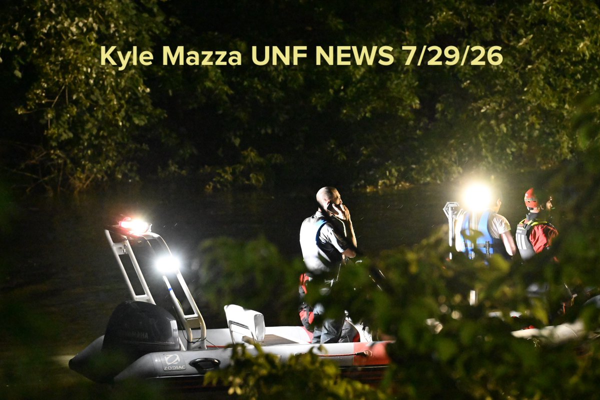 Passaic Police and other assisting towns work the scene where a 10-year-old boy was found dead and an ongoing operation is underway to find a 10-year-old girl after both children were in the Passaic River in the vicinity of Veterans Ct near a park in Passaic, New Jersey 