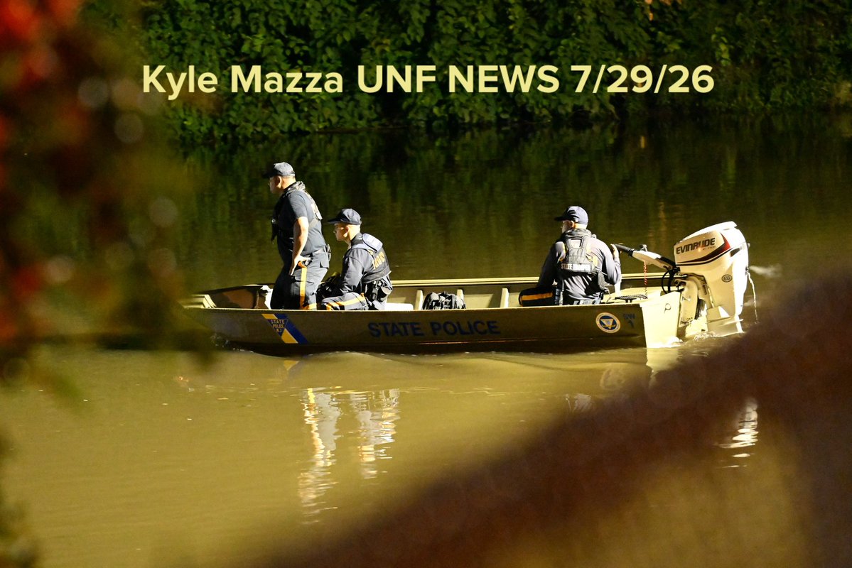 Passaic Police and other assisting towns work the scene where a 10-year-old boy was found dead and an ongoing operation is underway to find a 10-year-old girl after both children were in the Passaic River in the vicinity of Veterans Ct near a park in Passaic, New Jersey 