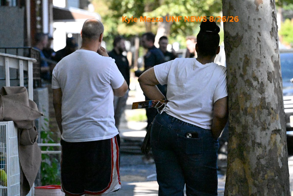 Trenton Fire Department personnel and investigators work the scene where two children died after a three-alarm house fire on the 300 block of Hewitt Street in Trenton, New Jersey